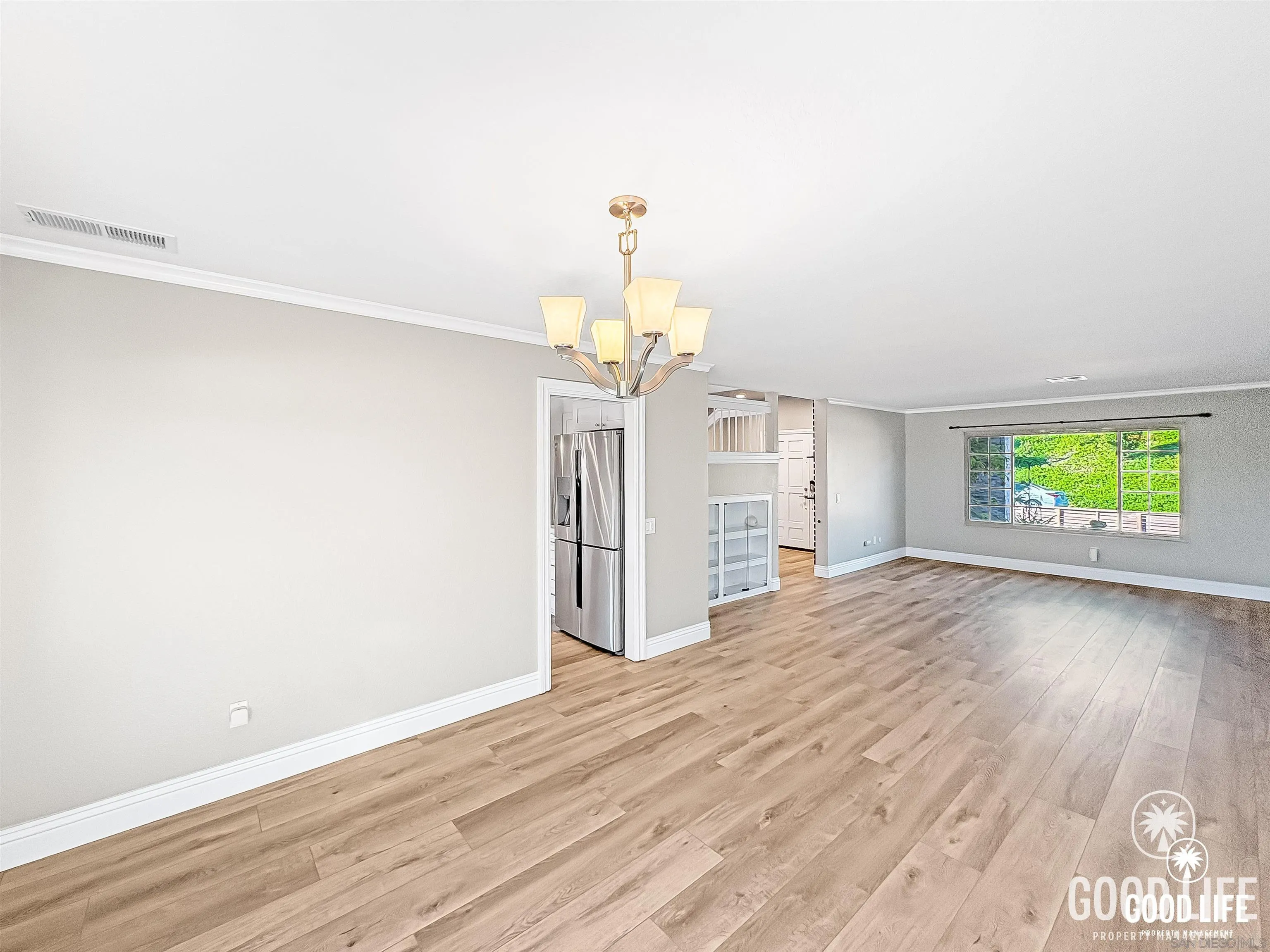 391 Via Almansa Encinitas, CA 92024 - Photo 28 of 29 wooden floor in an empty room with a window