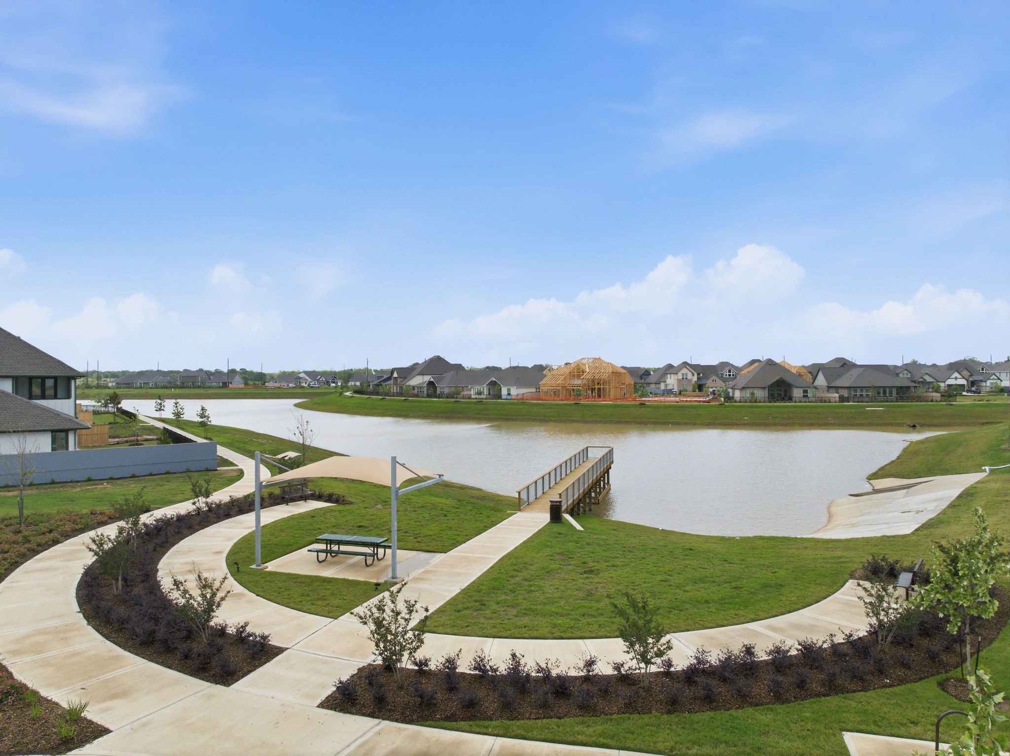 32503 Vly Redstem Way Fulshear, TX 77441 - Photo 7 of 18 a view of a swimming pool with a lake view