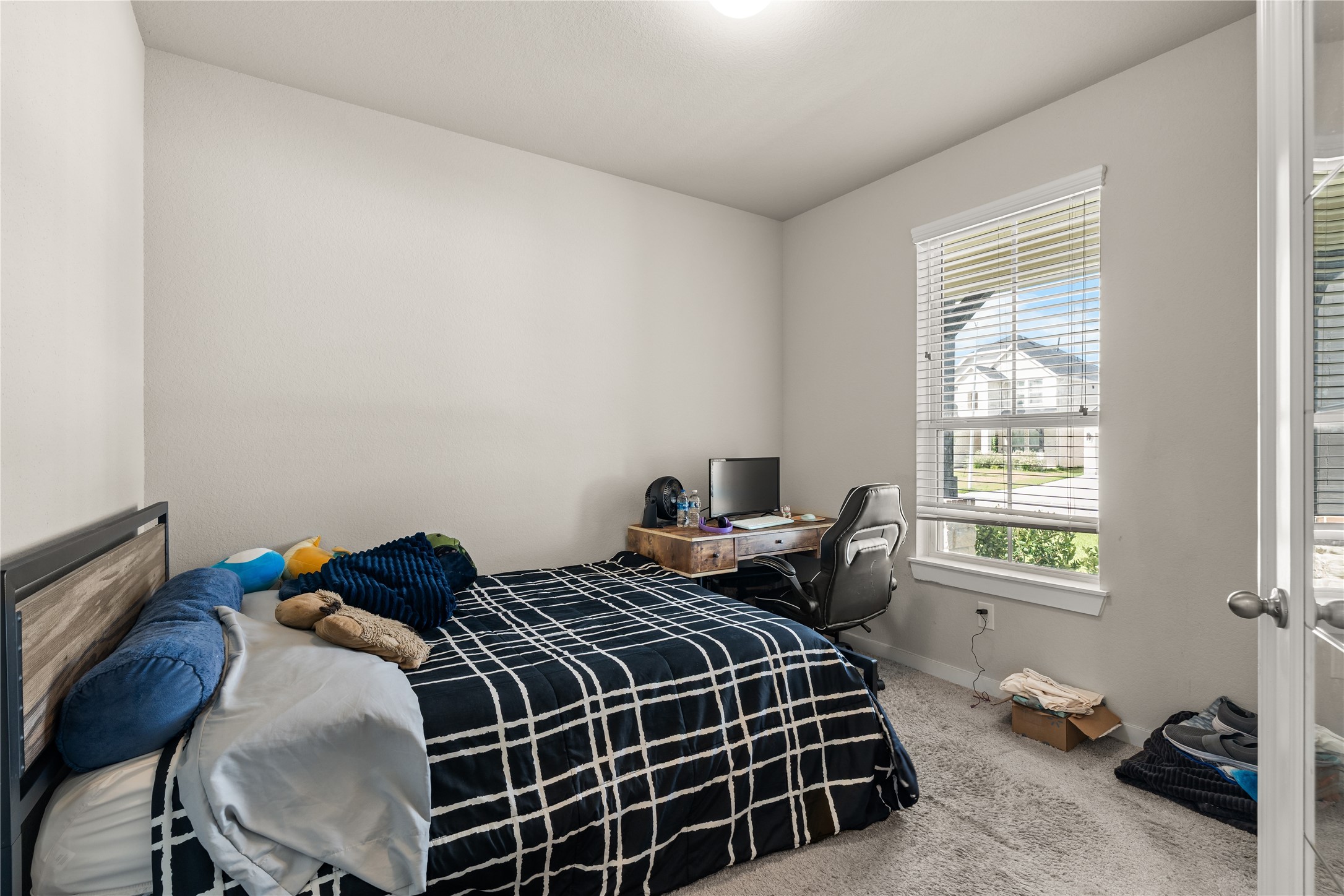 22939 Aspen Vista Dr Spring Spring, TX 77373 - Photo 15 of 29 Currently utilized as a bedroom, this versatile flex space can easily serve as a home office, study, hobby room, or guest room to fit your lifestyle.