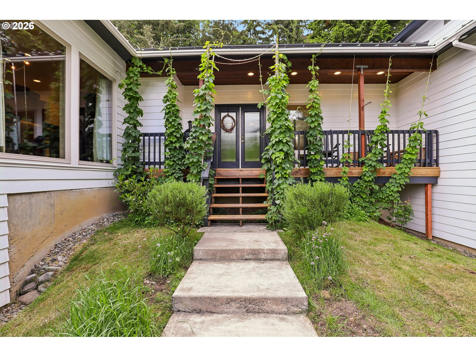 873 Mountain View Road Kalama, WA 98625 - Photo 5 of 45 a view of a pathway door front of house