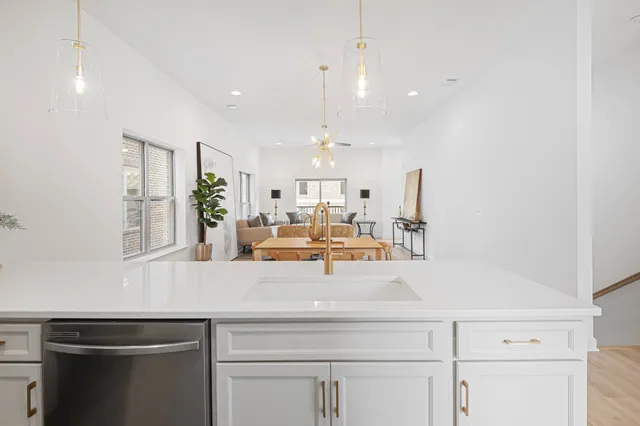 a view of living room with furniture and window