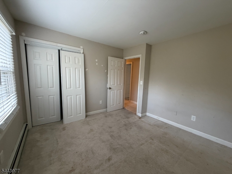 29 Billings Road Hopatcong, NJ 07843 - Photo 21 of 24 an empty room with windows