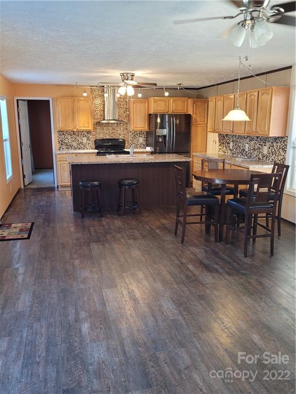 384 Stutts Road Mooresville, NC 28117 - Photo 3 of 17 a kitchen with a sink counter top space and appliances
