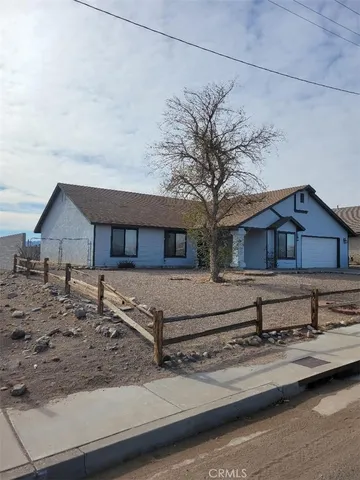 a house view with a outdoor space