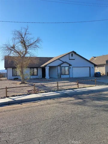 a view of a house with a bed