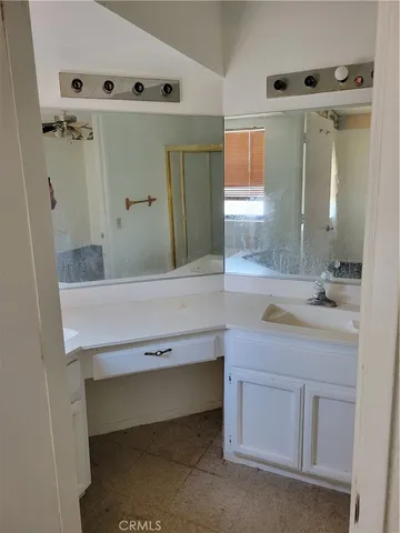 a room with a couch and a chair