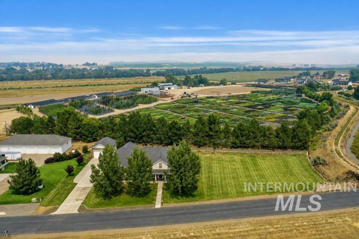 9222 Kemp Road Middleton, ID 83644 - Photo 5 of 35 Imagine having a tree farm/nursery behind your home. It looks and feels like you're out in a meadow. You don't come across this very often. It's gorgeous.