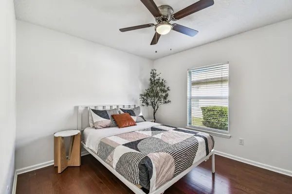 a bathroom with a sink vanity granite and a mirror
