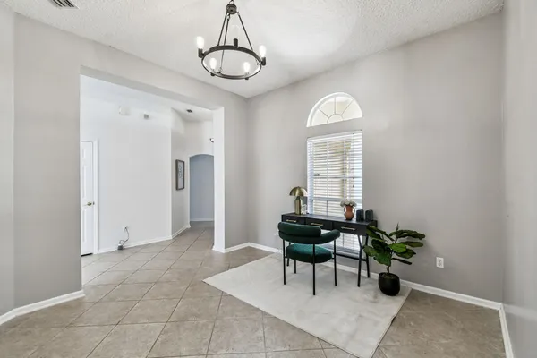 a view of a living room with a large window