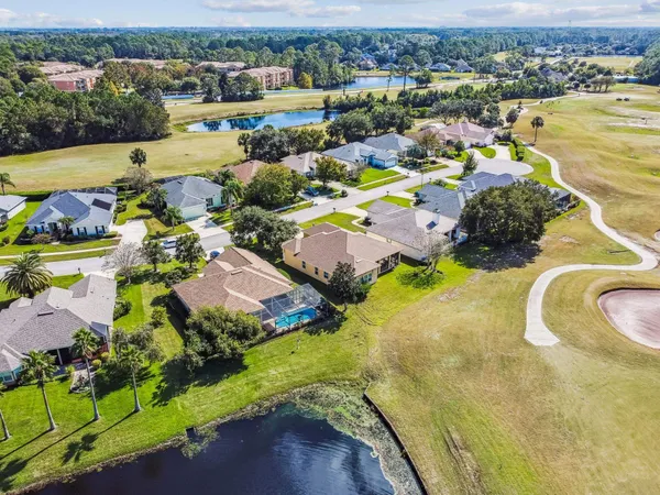 a view of swimming pool with outdoor seating