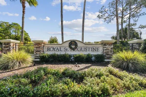 a view of a swimming pool with an outdoor seating