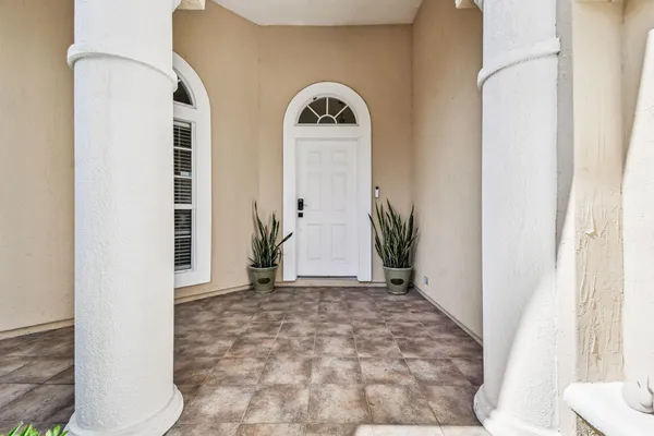a view of a livingroom with furniture and a cabinet