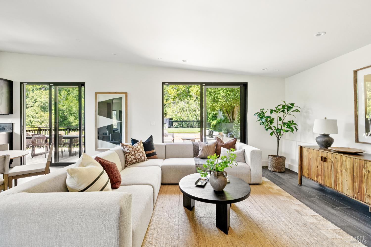 56 Millard Road Larkspur, CA 94939 - Photo 17 of 74 a living room with furniture and a large window