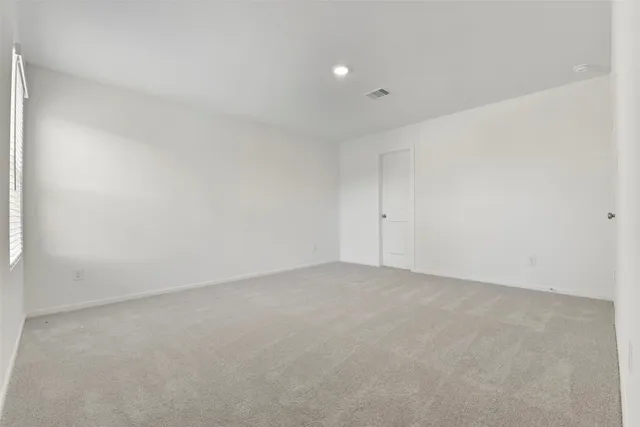 an empty room with an entryway