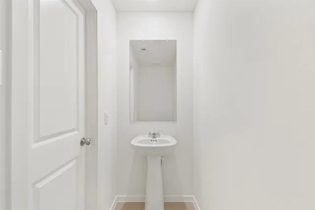 a sink with a mirror