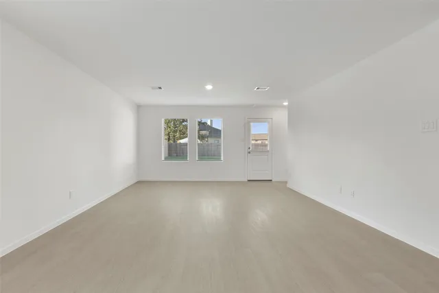 an empty room with windows