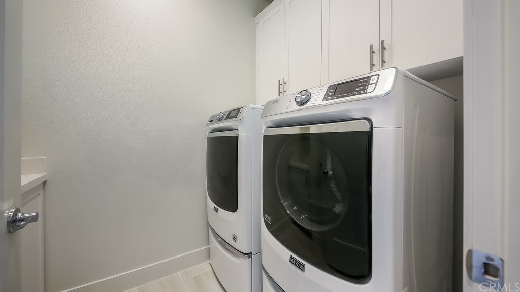 131 Novel Irvine, CA 92618 - Photo 12 of 15 a utility room with dryer and washer