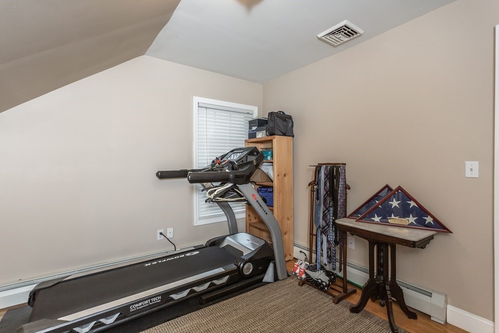 398 Chicago Street Fall River, MA 02721 - Photo 15 of 26 a room with gym equipment