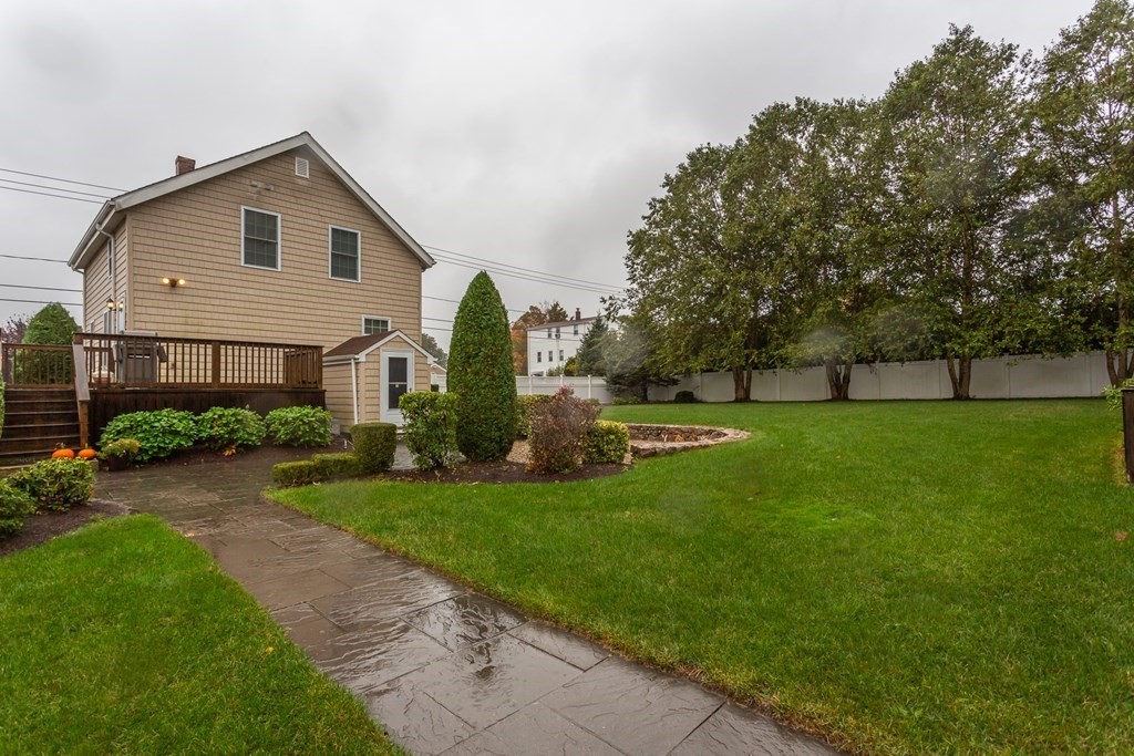 398 Chicago Street Fall River, MA 02721 - Photo 2 of 26 a front view of house with yard and green space