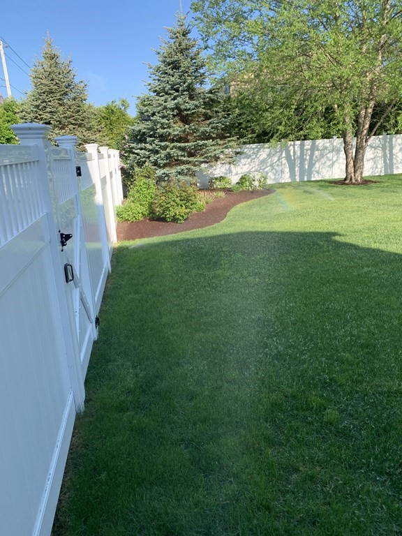 398 Chicago Street Fall River, MA 02721 - Photo 23 of 26 a view of a golf course with a garden