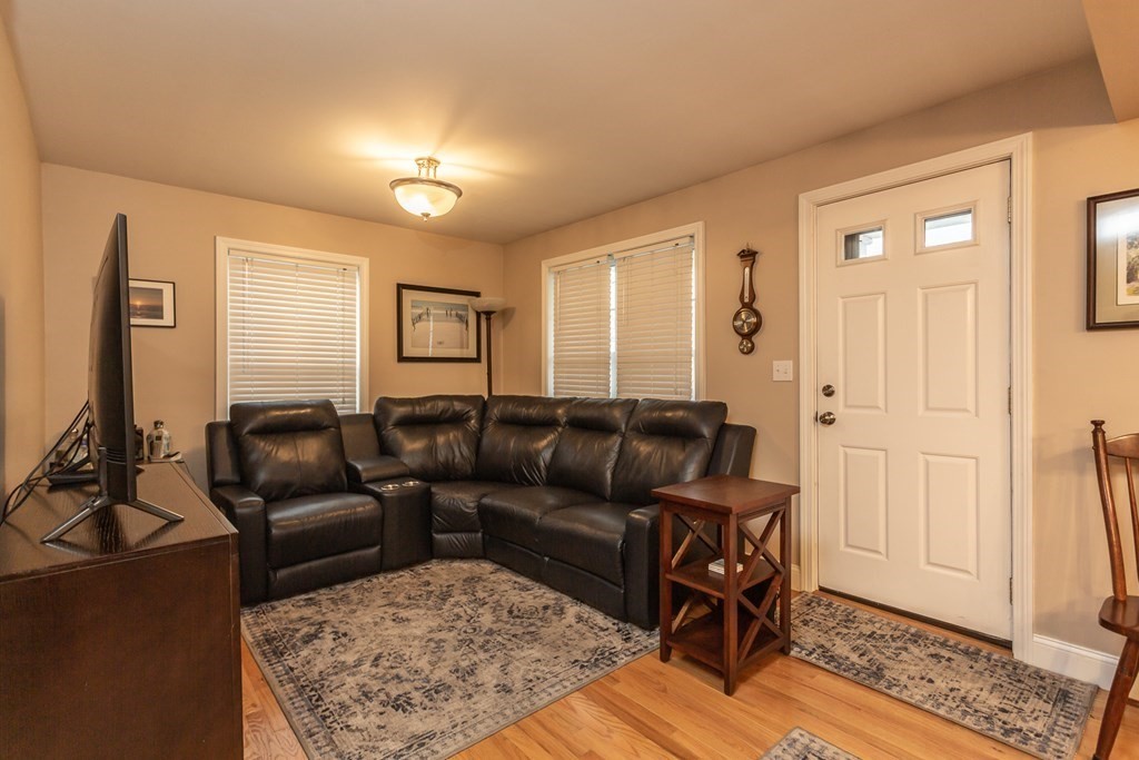 398 Chicago Street Fall River, MA 02721 - Photo 7 of 26 a living room with furniture and a wooden floor