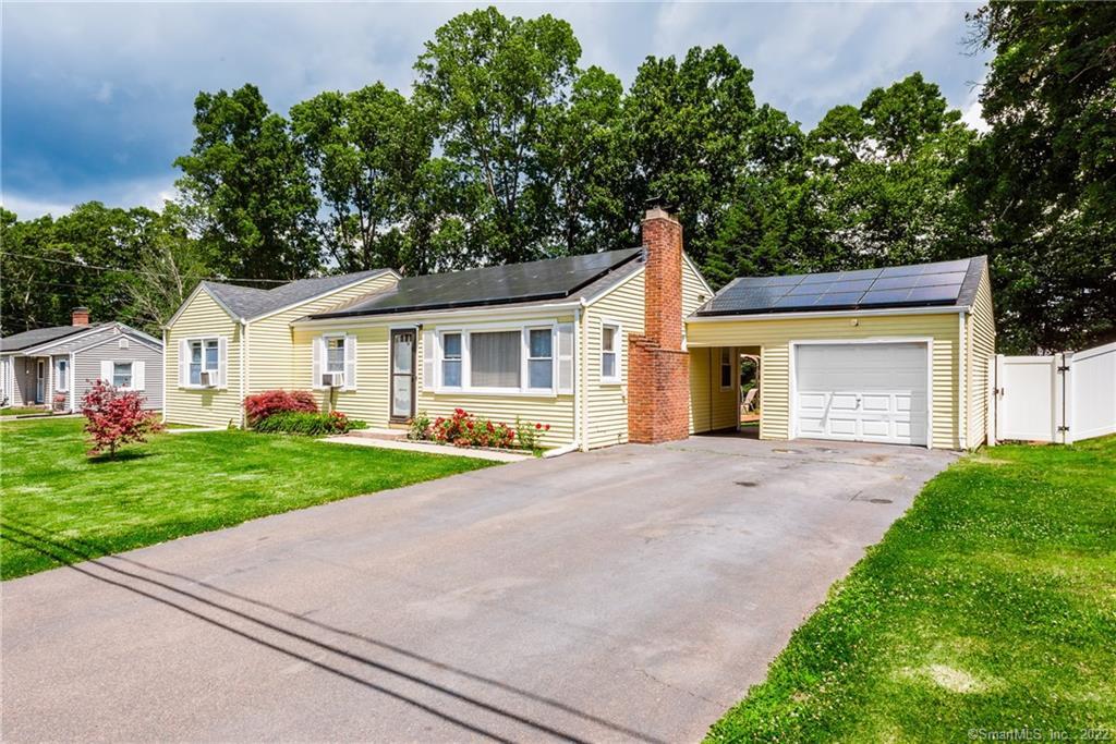 58 Robin Hill Road Meriden, CT 06450 - Photo 1 of 1 a view of an house with backyard and garden