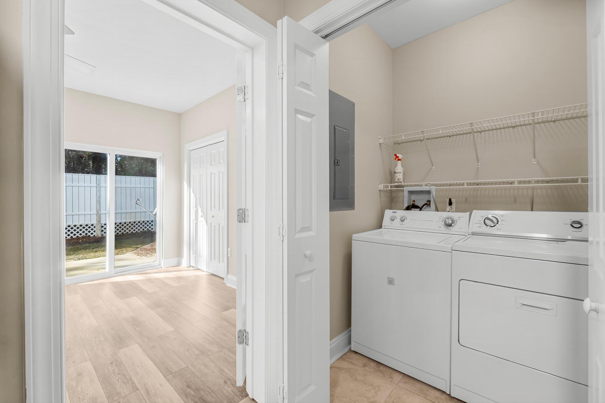 254 South Co Highway 393, Unit 2 Santa Rosa Beach, FL 32459 - Photo 15 of 45 a utility room with dryer and washer