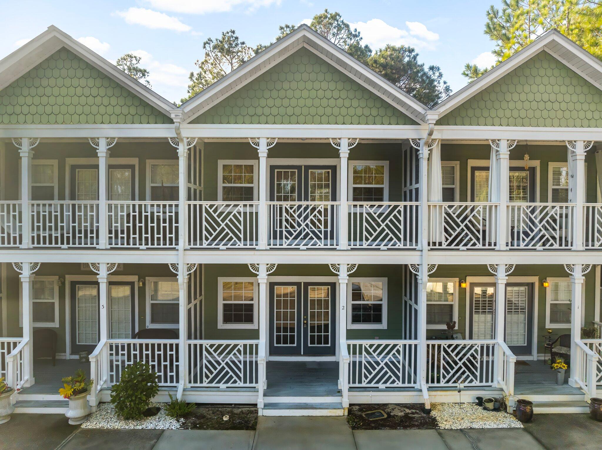 254 South Co Highway 393, Unit 2 Santa Rosa Beach, FL 32459 - Photo 2 of 45 front view of a house with large windows