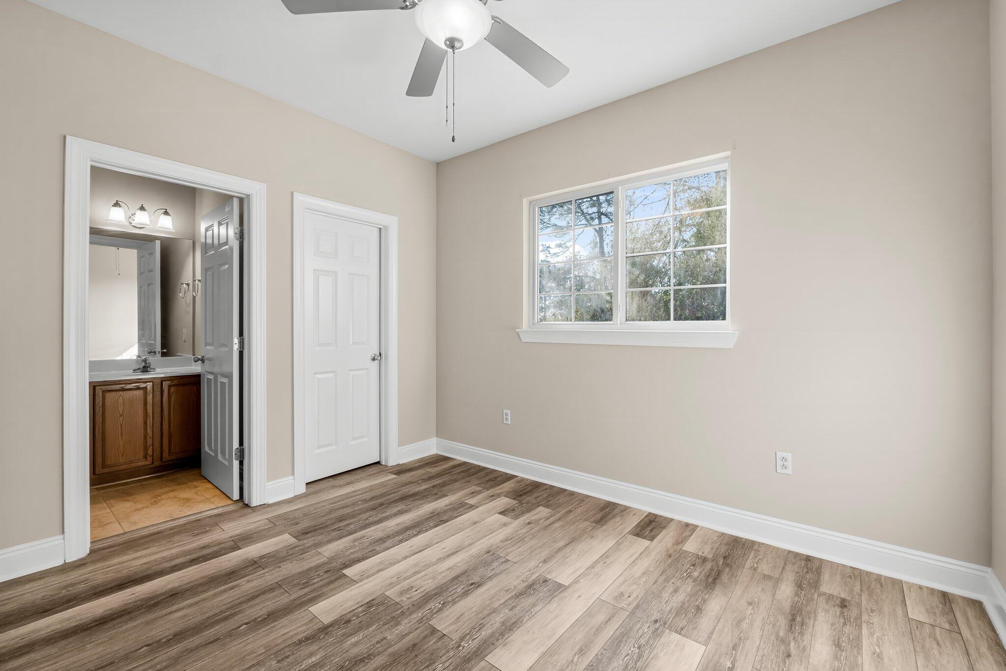 254 South Co Highway 393, Unit 2 Santa Rosa Beach, FL 32459 - Photo 22 of 45 an empty room with a bathroom and a sink