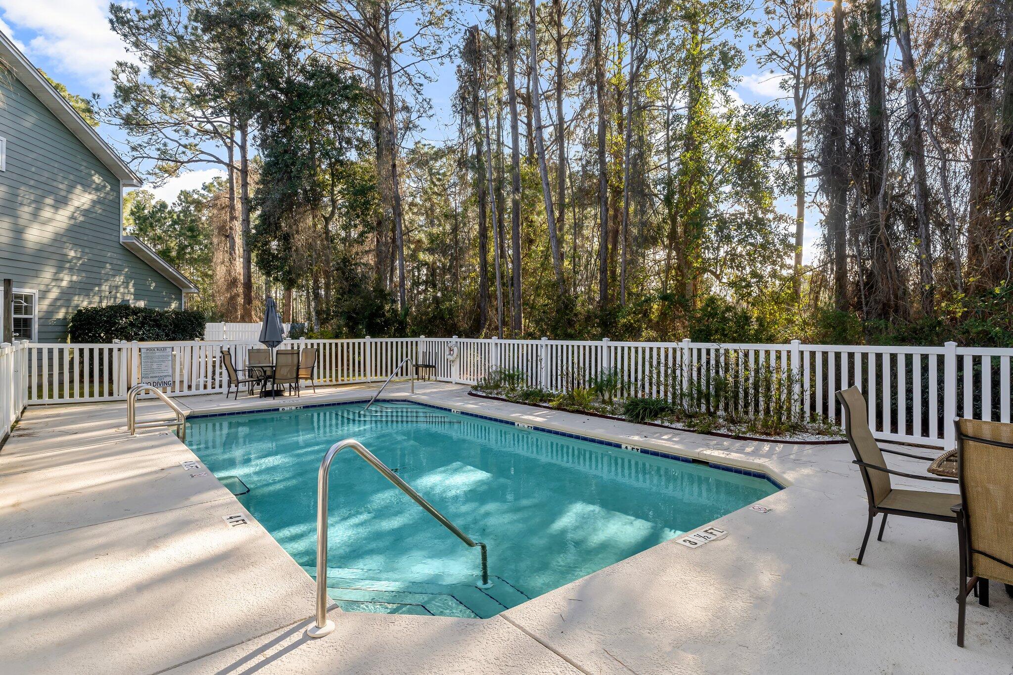 254 South Co Highway 393, Unit 2 Santa Rosa Beach, FL 32459 - Photo 32 of 45 a view of a garden with deck