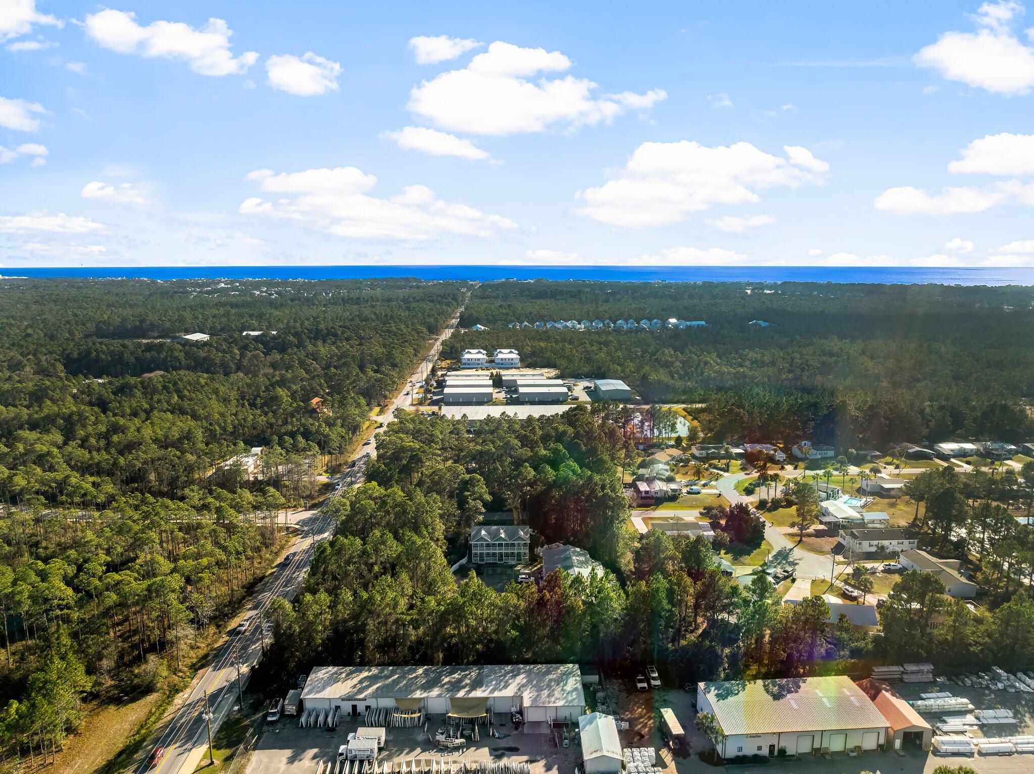 254 South Co Highway 393, Unit 2 Santa Rosa Beach, FL 32459 - Photo 39 of 45 a view of a lake with a city