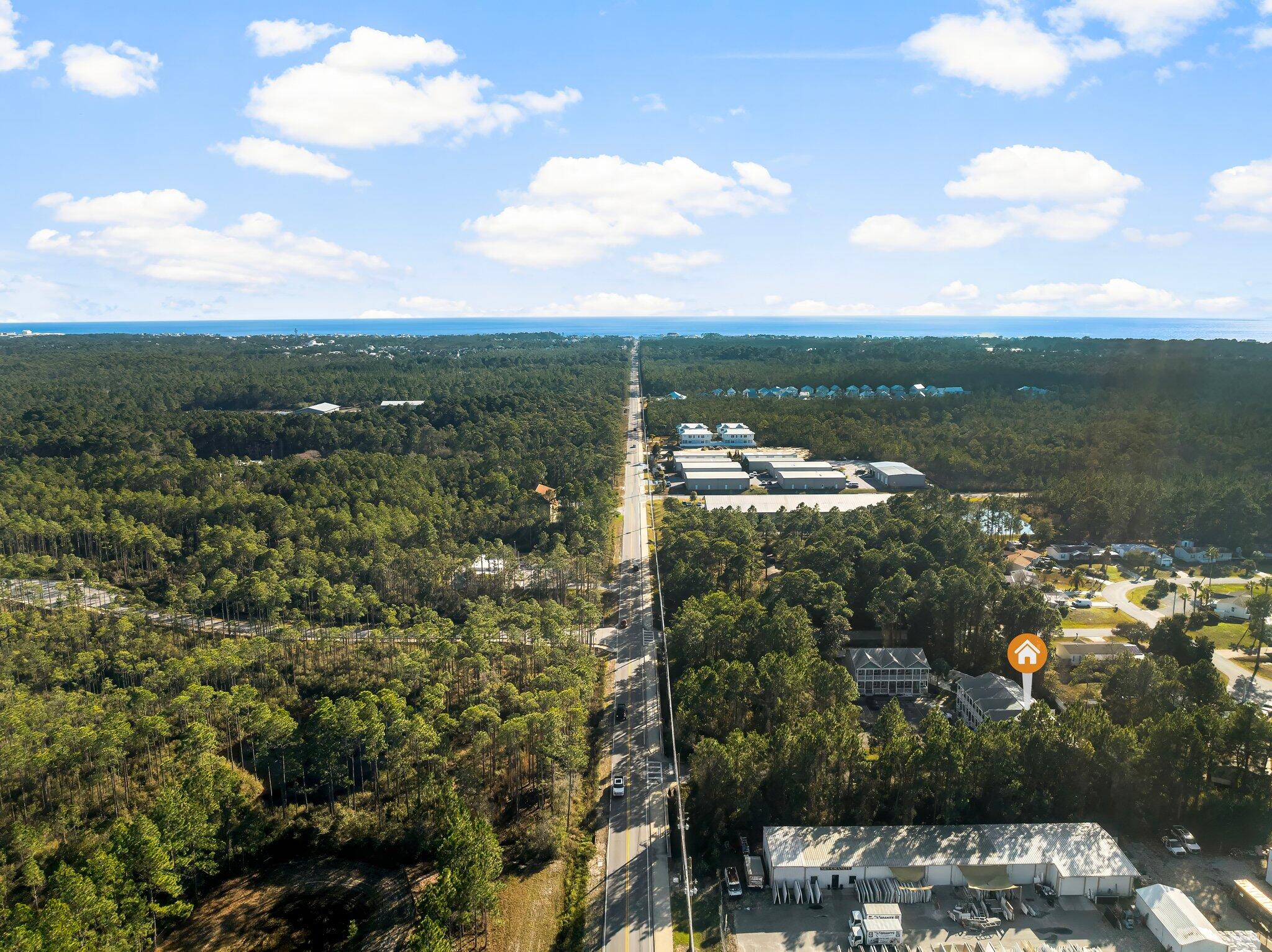 254 South Co Highway 393, Unit 2 Santa Rosa Beach, FL 32459 - Photo 40 of 45 a view of a lake with a city