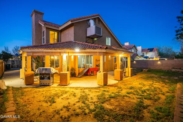 a view of a house with a patio