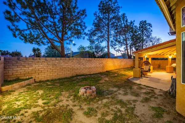 a view of a yard with an outdoor space