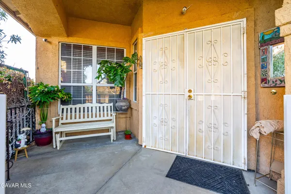 a view of a porch with a backyard