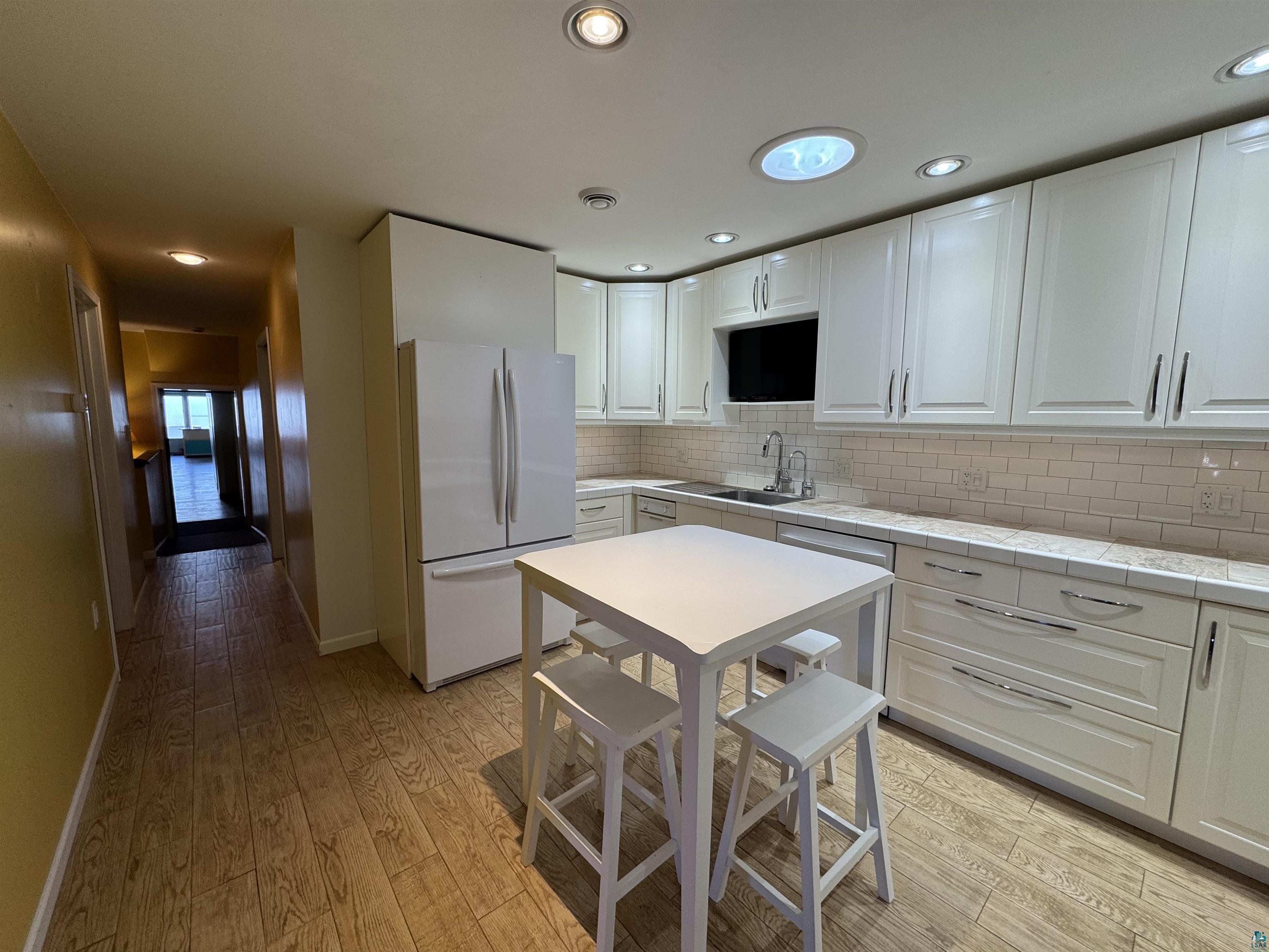 406 4th Street Moose Lake, MN 55767 - Photo 9 of 42 Lots of Lighting in Kitchen