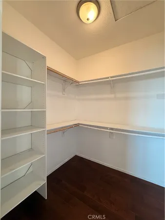 a view of an empty walk in closet