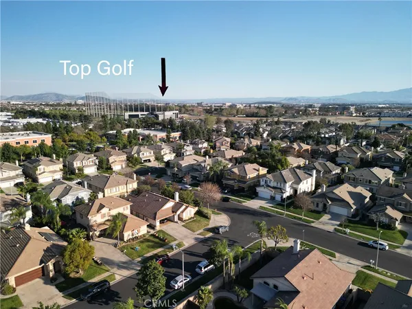 an aerial view of a house with a ocean view