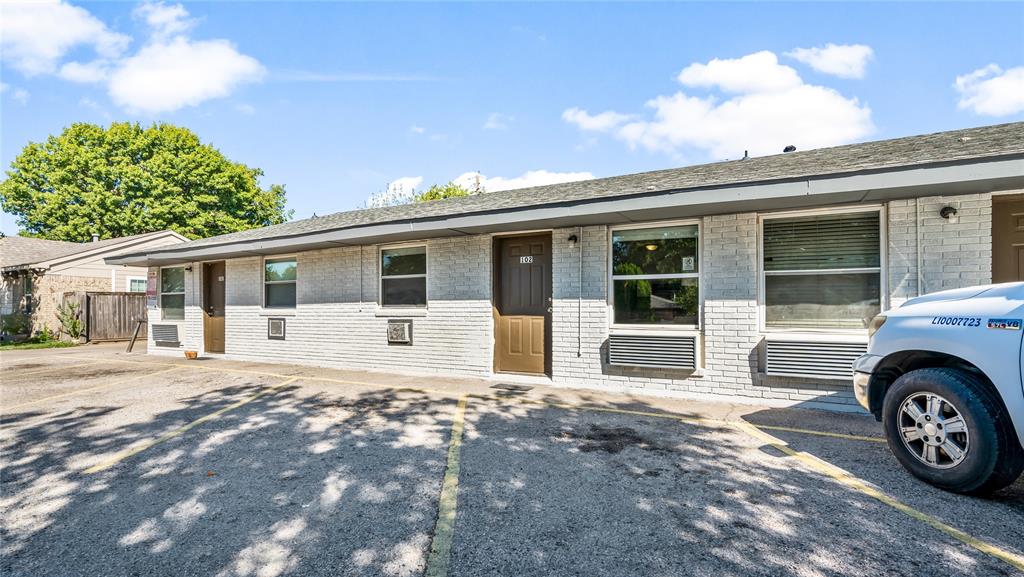 2001 Carl Road Irving, TX 75061 - Photo 2 of 16 a front view of a house with a yard