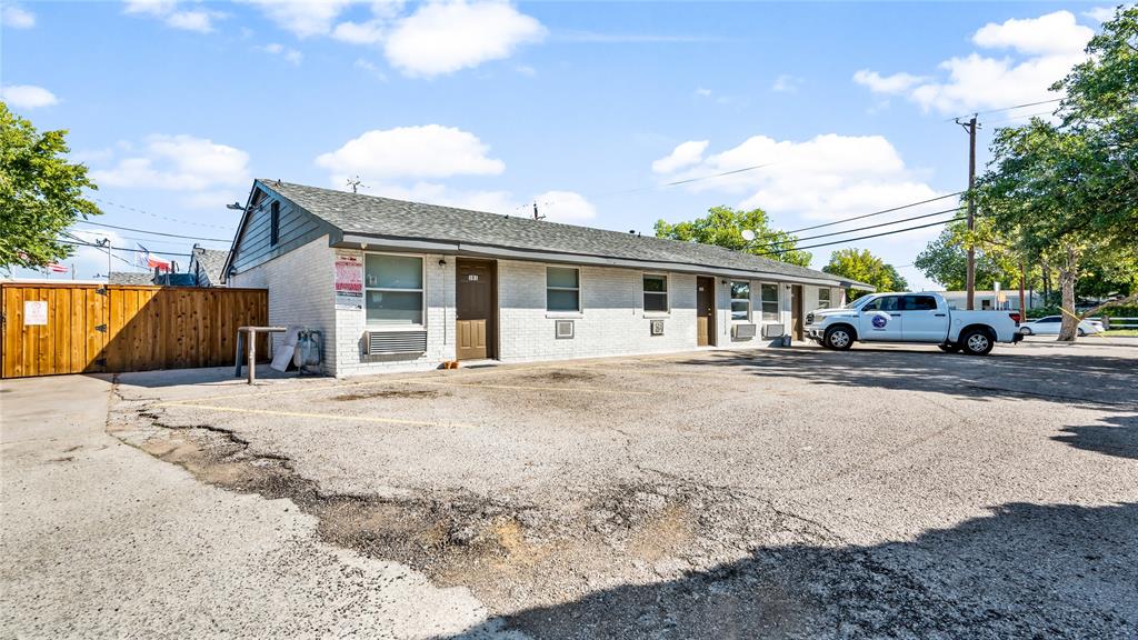 2001 Carl Road Irving, TX 75061 - Photo 3 of 16 a view of a house with snow on the road
