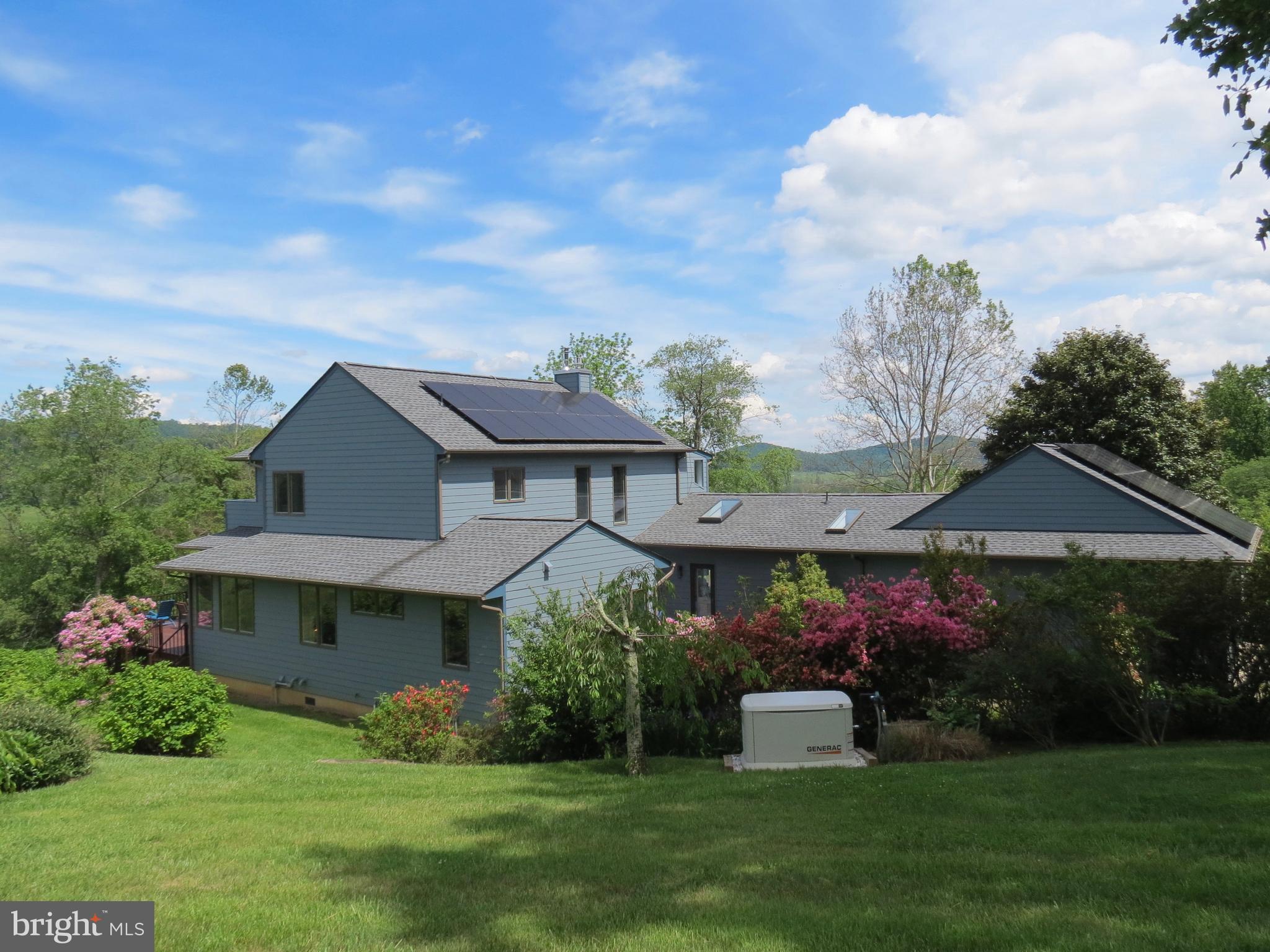 335 Fodderstack Road Washington, VA 22747 - Photo 4 of 52 Back of the house showing hidden generator