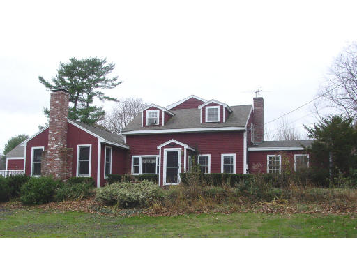 12 Mortimer Road Boxford, MA 01921 - Photo 1 of 1 a front view of a house with a yard