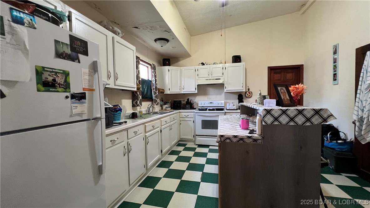 134 West 8th Street Eldon, MO 65026 - Photo 8 of 49 Kitchen offers plenty of cabinet and counter space