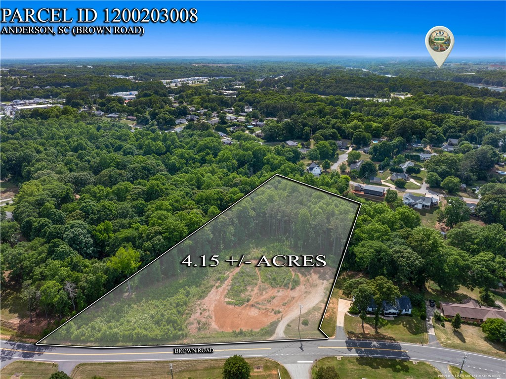 0 Brown Road Anderson, SC 29621 - Photo 5 of 9 A generous parcel of land spanning 4.15 acres, nestled amidst verdant surroundings with direct road access.