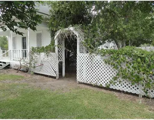 a view of a wooden fence