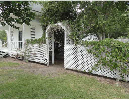 4120 Ballard Road Robstown, TX 78380 - Photo 3 of 8 a view of a wooden fence
