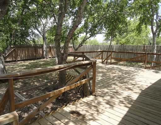 4120 Ballard Road Robstown, TX 78380 - Photo 7 of 8 a view of a yard with wooden fence