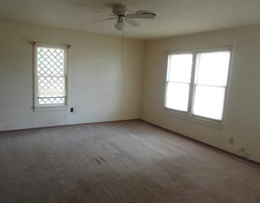 4120 Ballard Road Robstown, TX 78380 - Photo 8 of 8 an empty room with a window