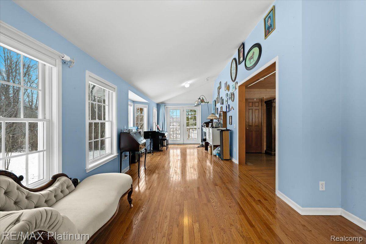 3566 Curdy Road Howell, MI 48855 - Photo 18 of 57 Your suite continues w/ sun room w/ porch entrance