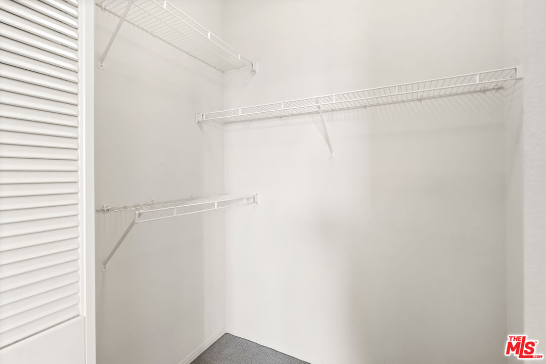100 South Alameda Street, Unit 418 Los Angeles, CA 90012 - Photo 15 of 32 a view of an empty walk in closet